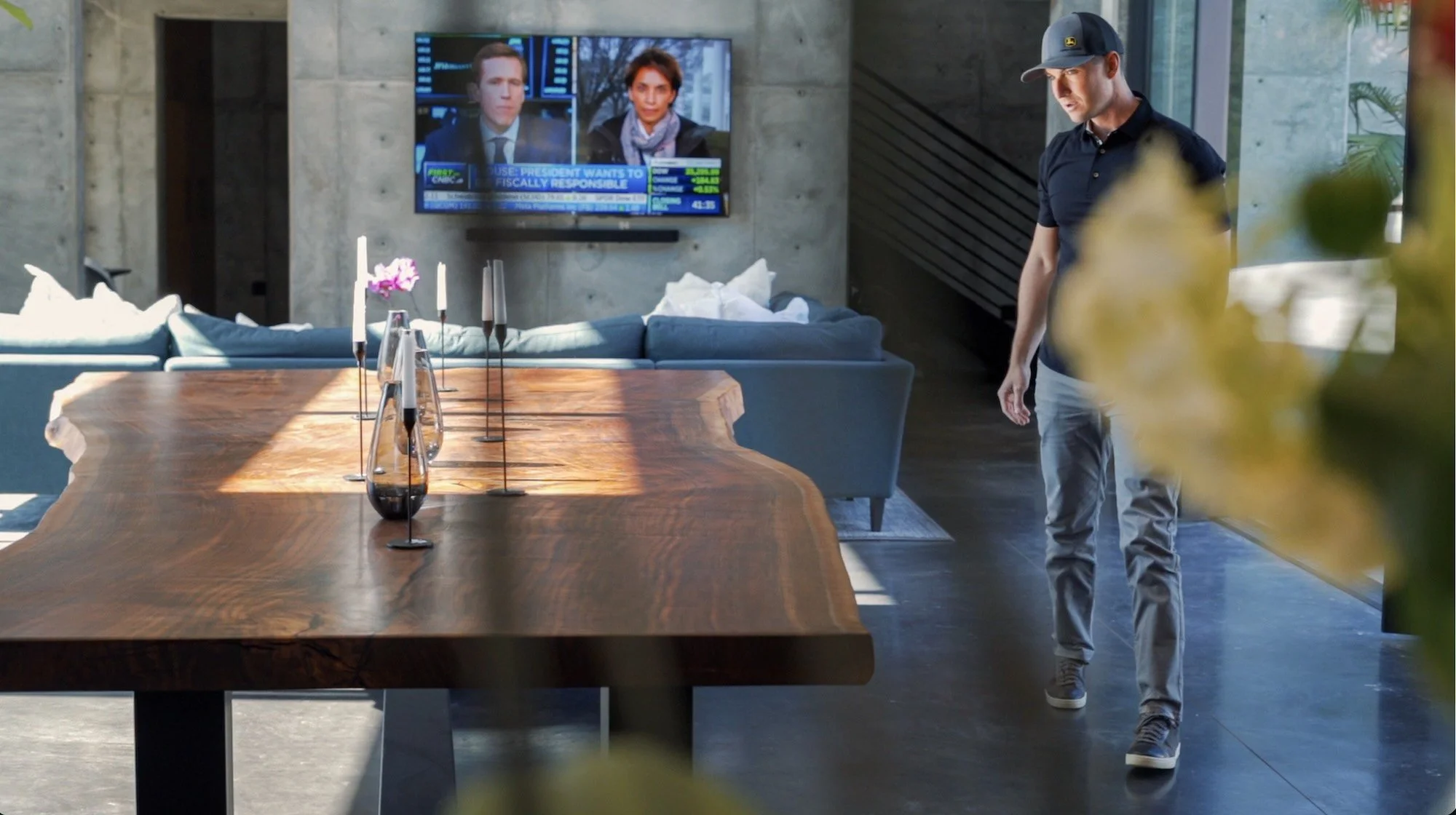 Handcrafted custom live edge dining table made from premium reclaimed timber in a modern San Diego living room, showcasing natural wood grain and unique live edge details