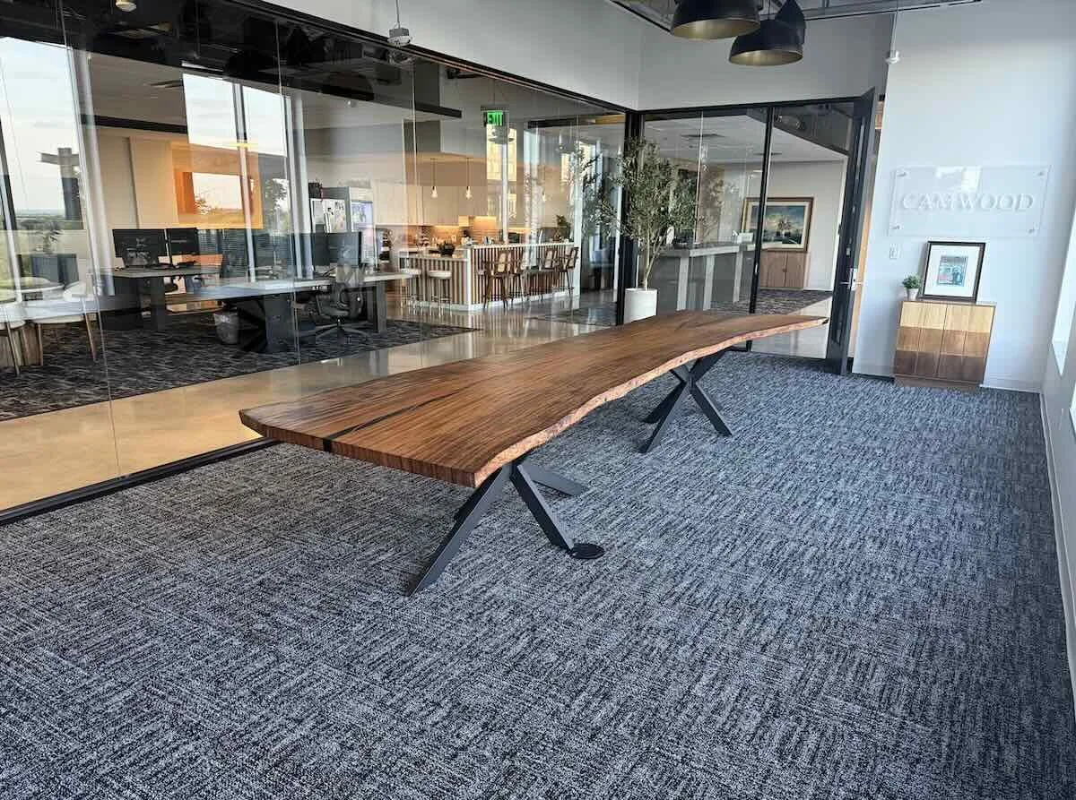 Bespoke live edge Monkey Pod conference table with black steel X-base, handcrafted by Kristopher Kirkpatrick for a high-end San Diego corporate office