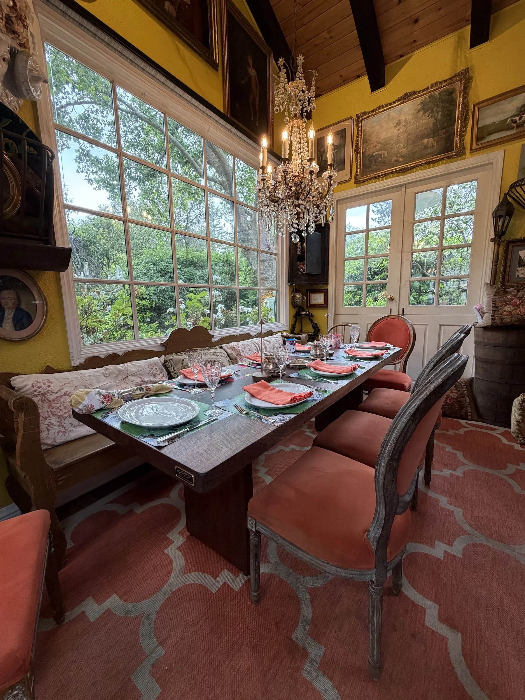 Custom solid walnut dining table set for a family gathering in a traditional dining room