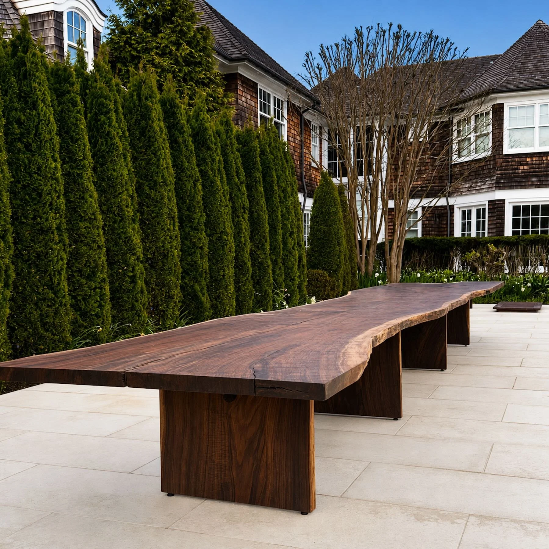 25-foot Claro walnut live edge table custom built for a Hamptons residence