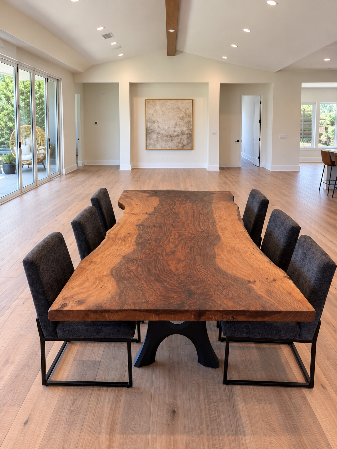 Custom Bastogne walnut live edge table showcasing dramatic grain and natural color variation