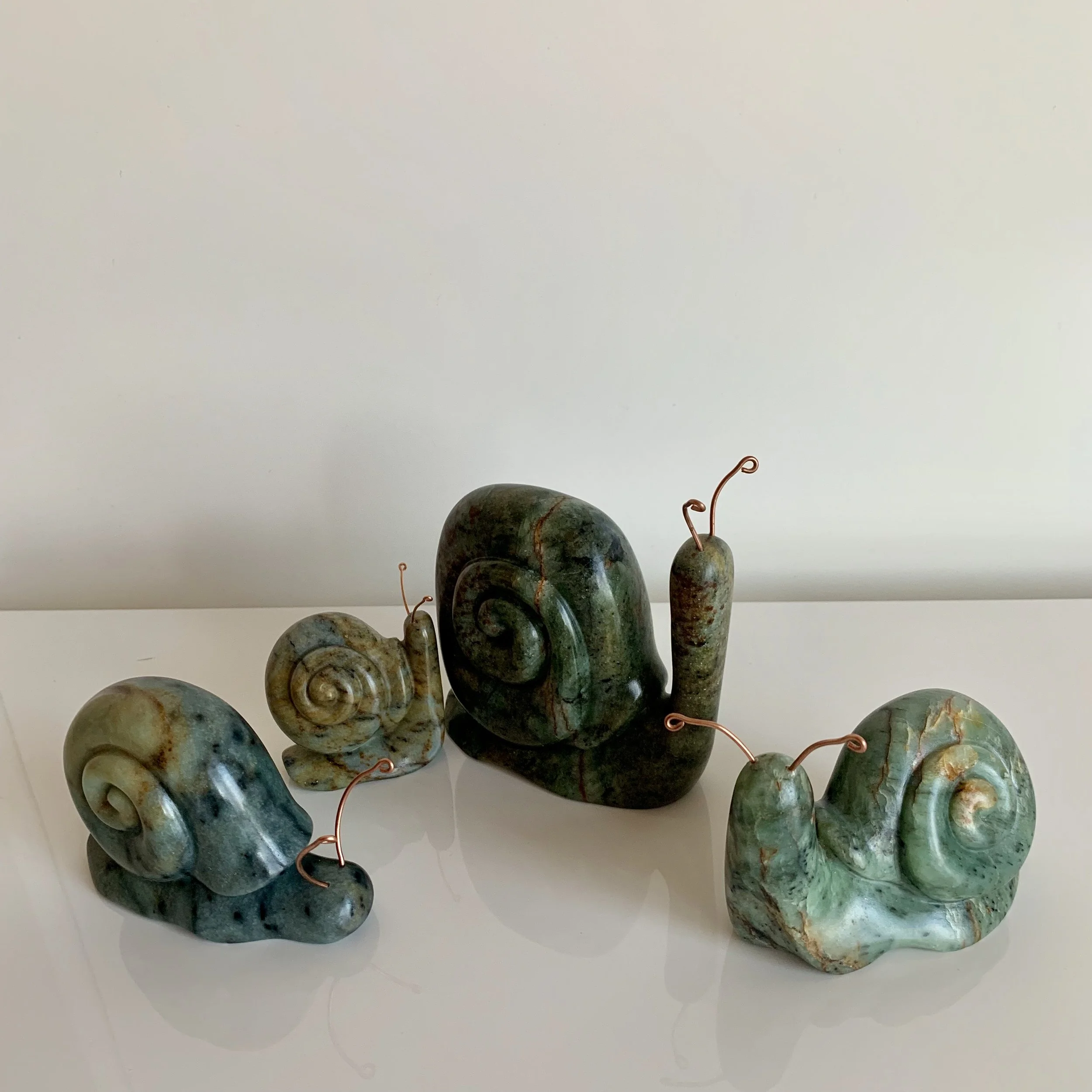 Soapstone Snails by Lisa Douziech