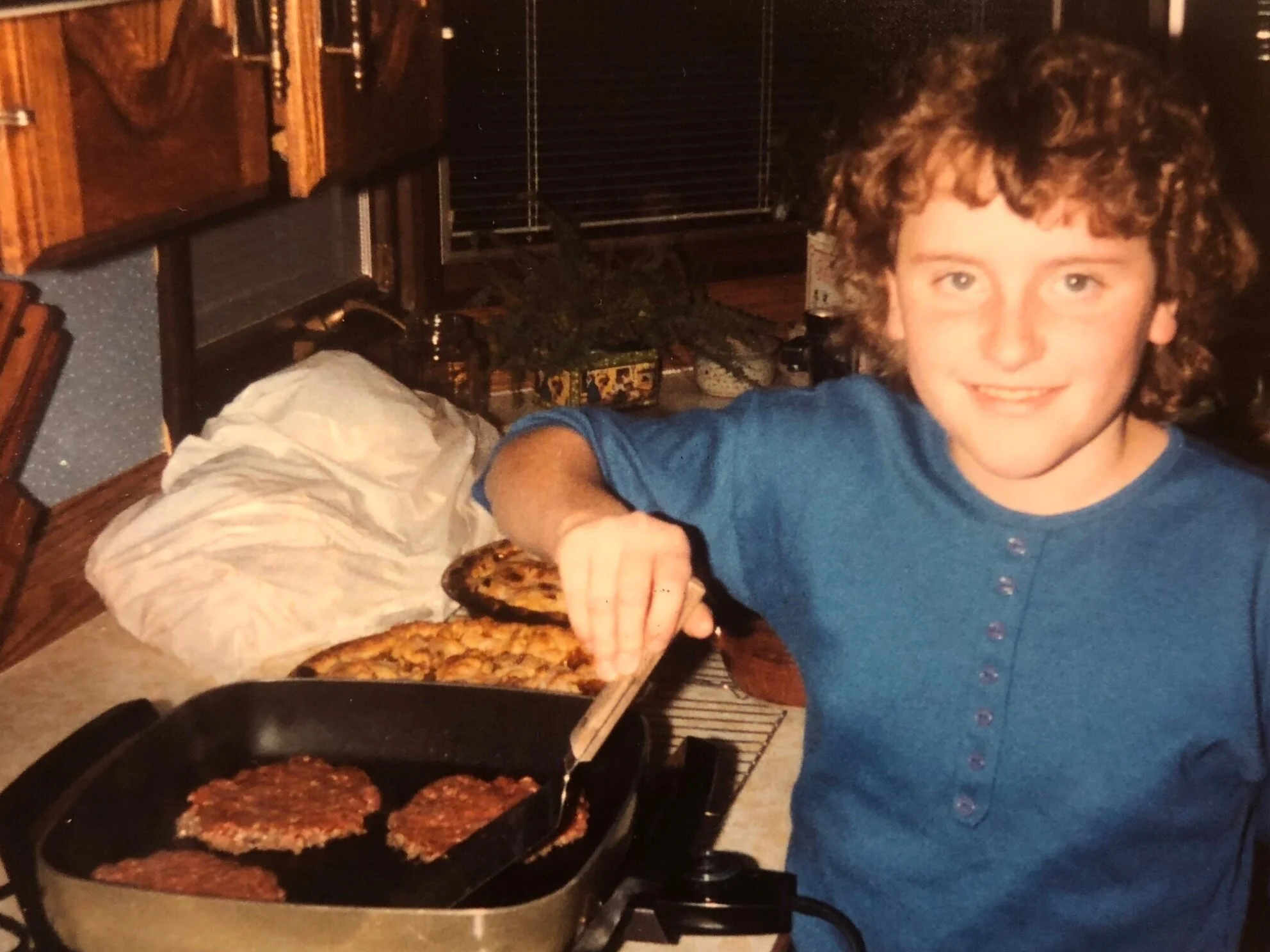 Ten year-old me just casually frying up some burgers on a Friday night, as you do. Also, pie.