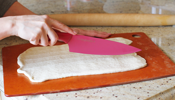Now cut your dough into one inch strips.