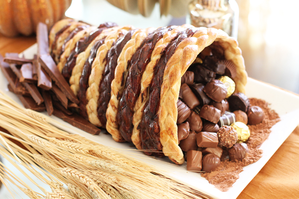 Chocolate Cornucopia! Pretty awesome, huh? Yeah, I think so too. This one was fully braided and then once cooked we painted every other braid with our chocolate paint (2 tbs cocoa and 3 tablespoons of light corn syrup). Then fill with super yummy chocolates : )