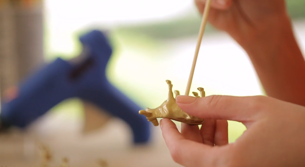 Immediately press your wooden skewer into the animal and hold steady until dry (about 1 minute).