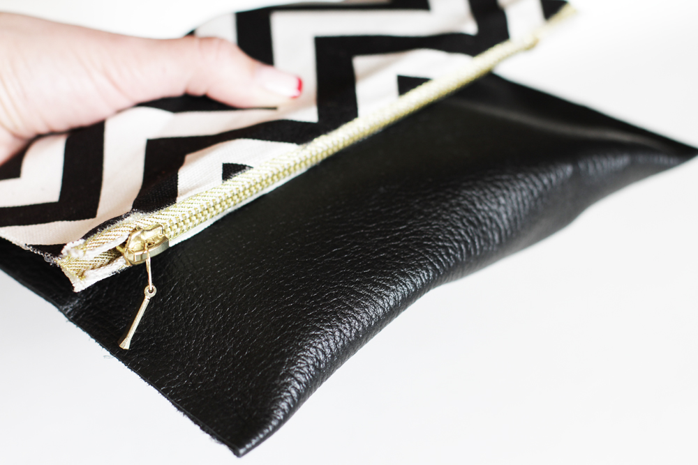 On this bag I used the leather on the bottom and applied soft chevron fabric to the top so I could fold it over.