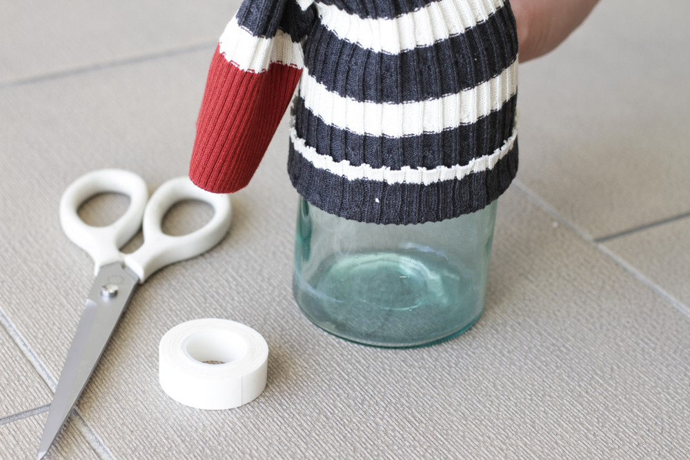 Now flip the hem up and press down the tape and turn the cuff right side out.
