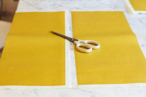 Now unfold the paper and cut the paper down the middle on the crease. I left my white edges on because I liked the look.