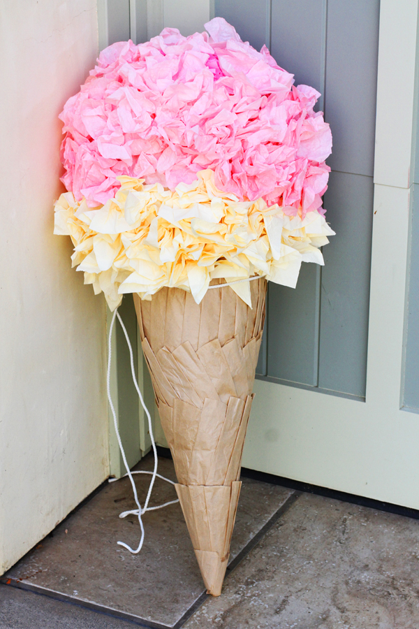 My masterpiece! I ended up using ivory napkins for the bottom half of the cone. And this worked great! I like the look of the two colors. As for the cone, those are just brown coffee filters. They are all folded in half and hot glued to the actual cone.