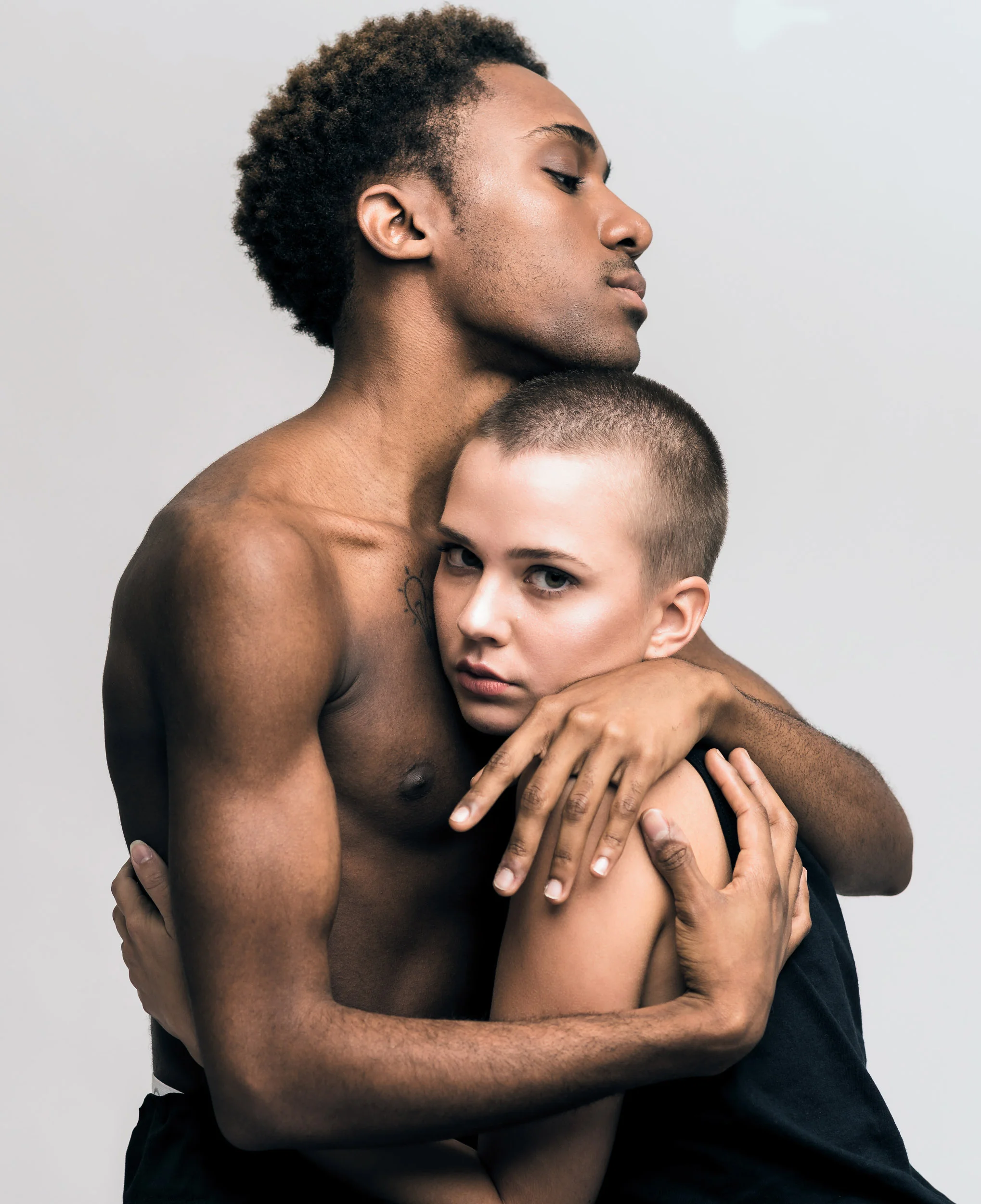 Probably my favorite vertical image from the shoot, I just love the look & feeling captured here. He was actually sitting down on a stool, but I felt the crop emphasized the feeling between the two of them here.