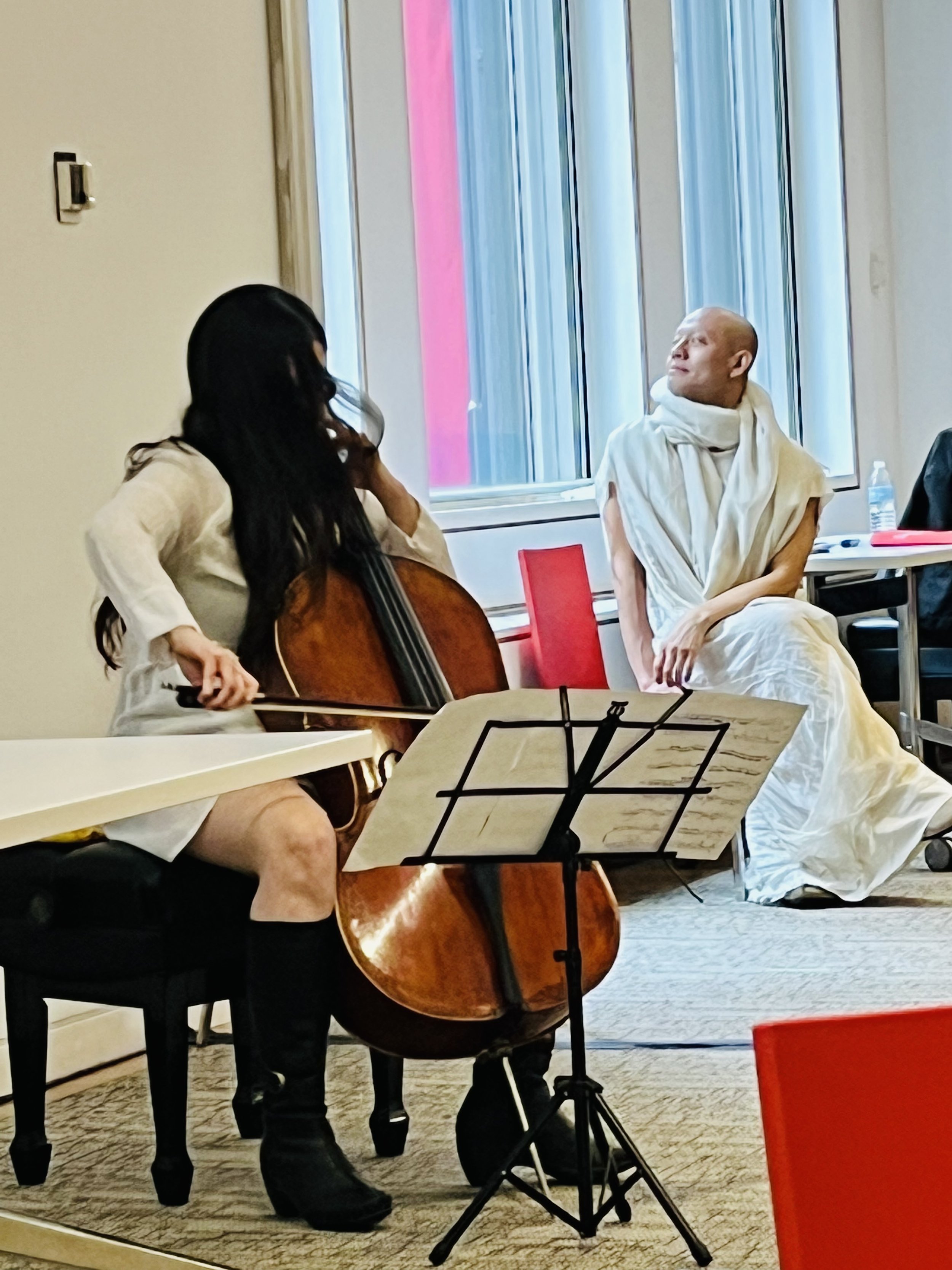Tamar Sagiv Cellist with Kien Chu in background.jpg