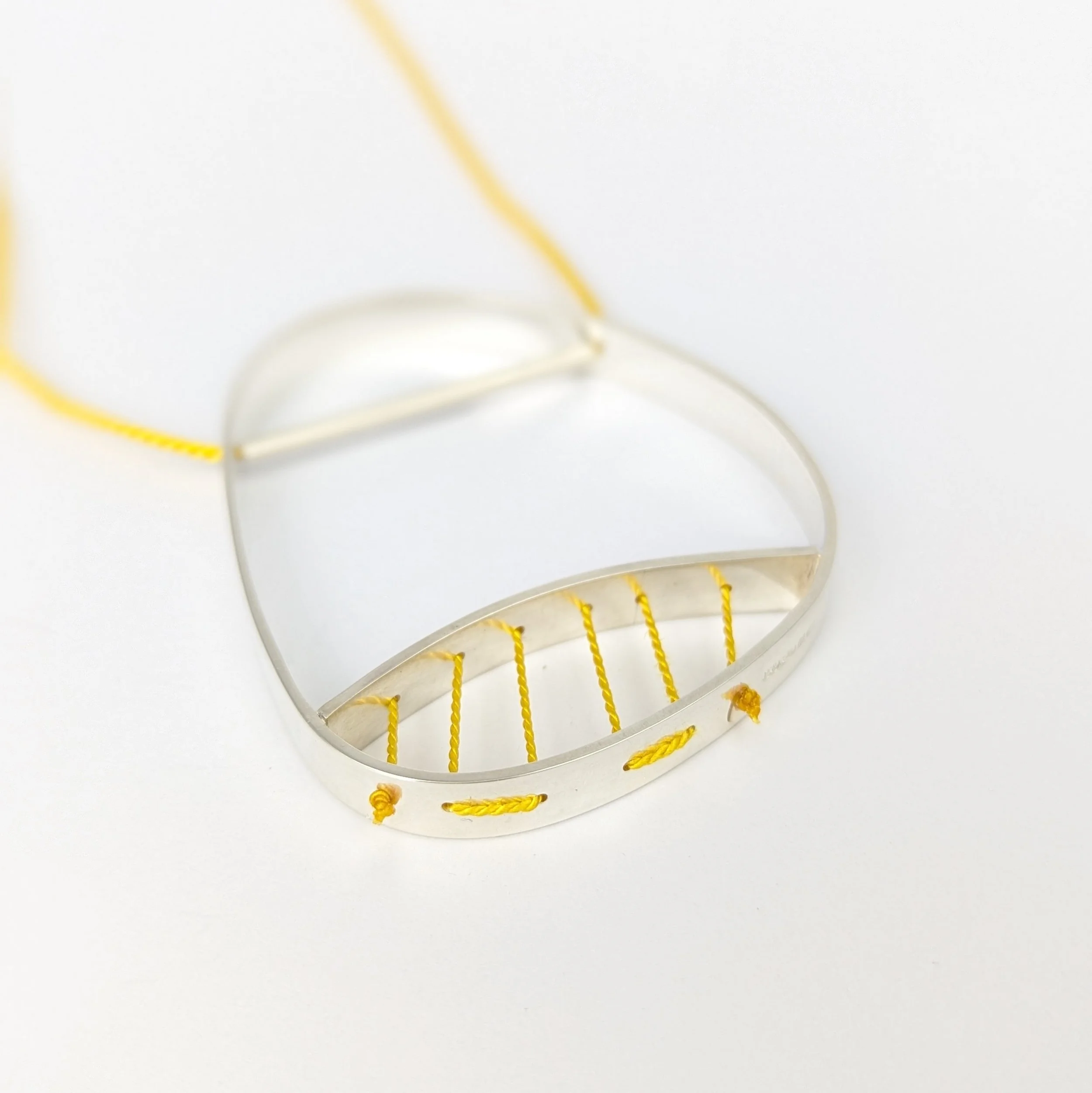 Hepworth necklace yellow on yellow3.jpg