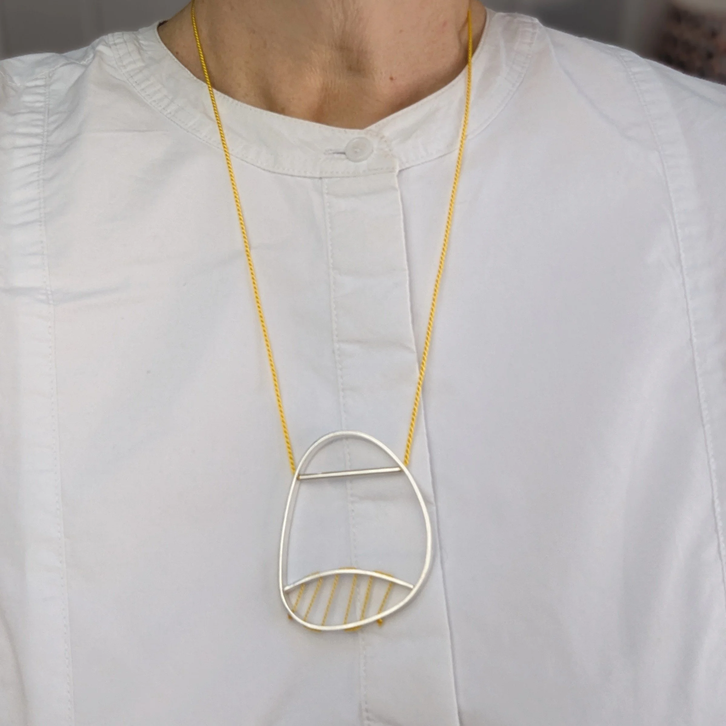 Hepworth necklace yellow on yellow.jpg
