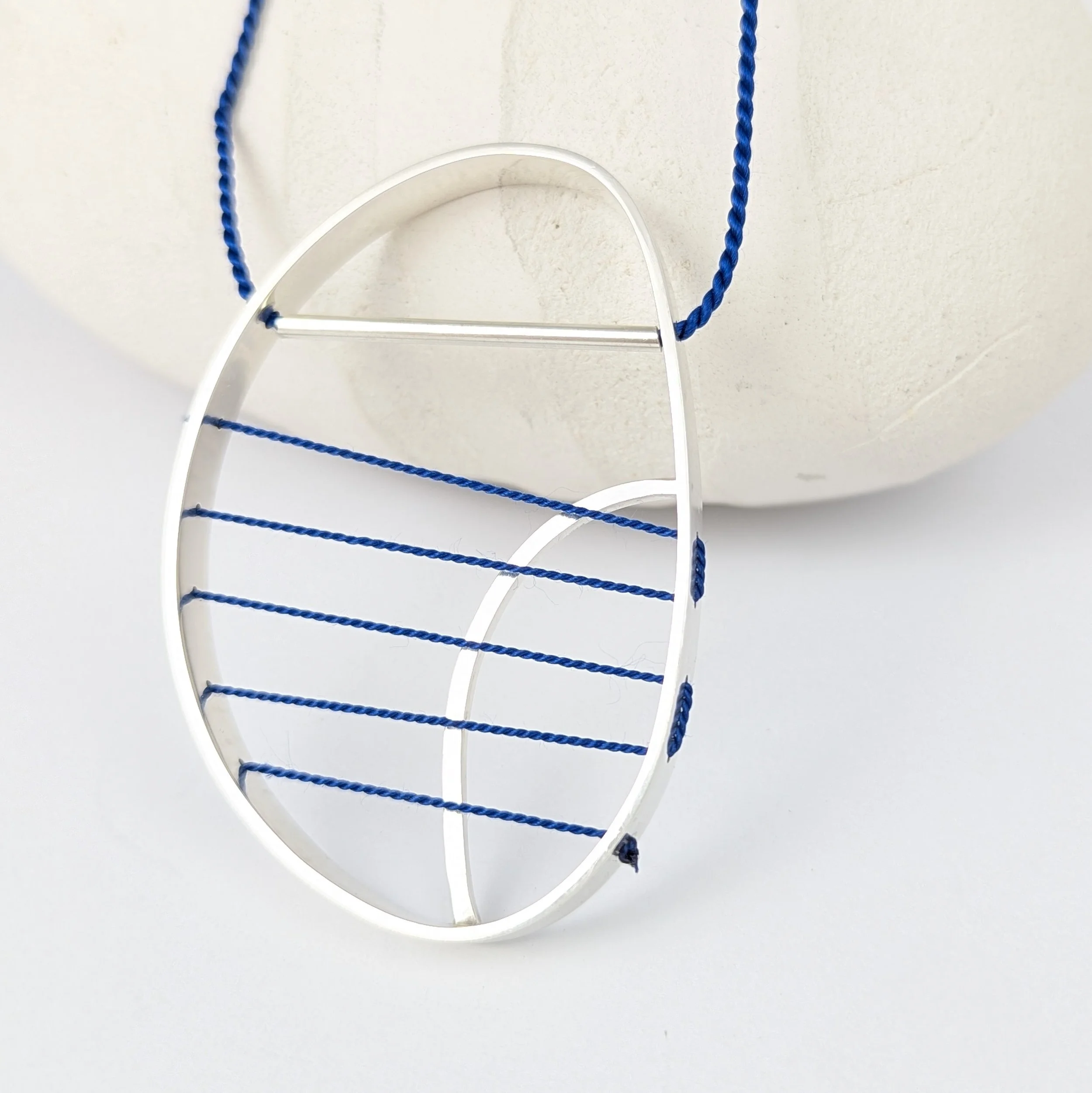 Hepworth necklace blue on blue3.jpg