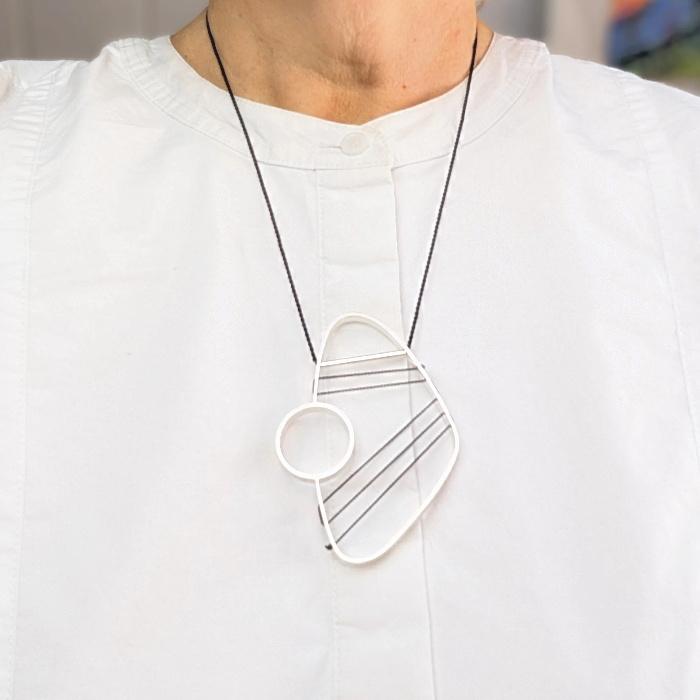 Hepworth necklace geo blk on blk.jpg