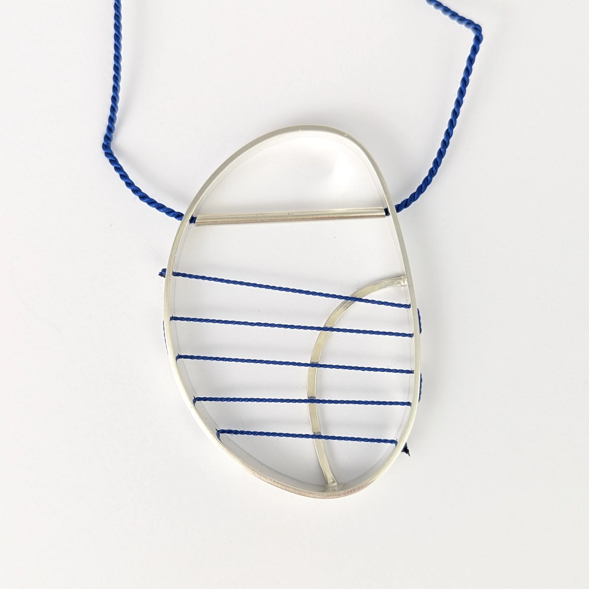 Hepworth necklace blue on blue2.jpg
