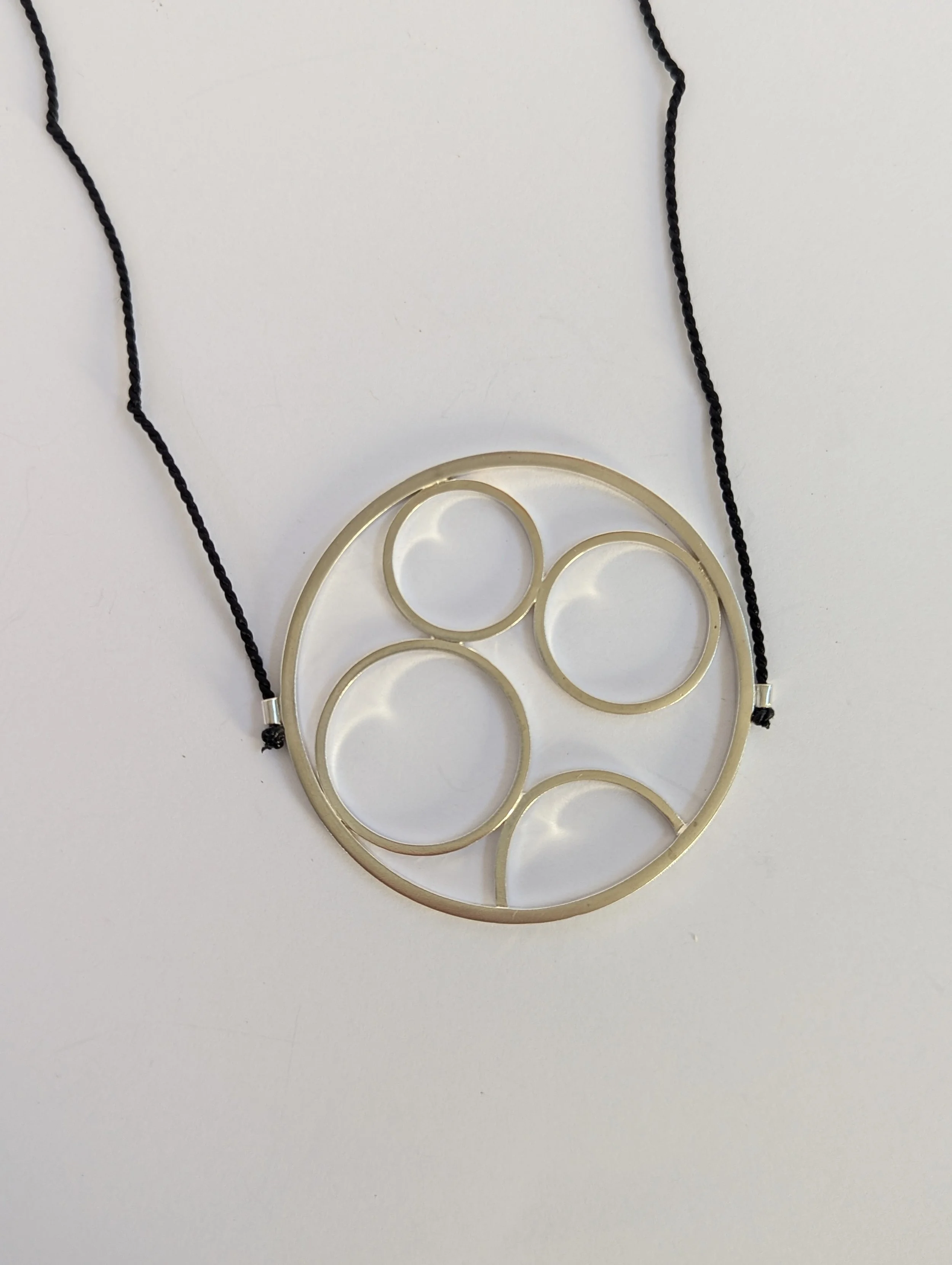 encircled necklace on black2.jpg