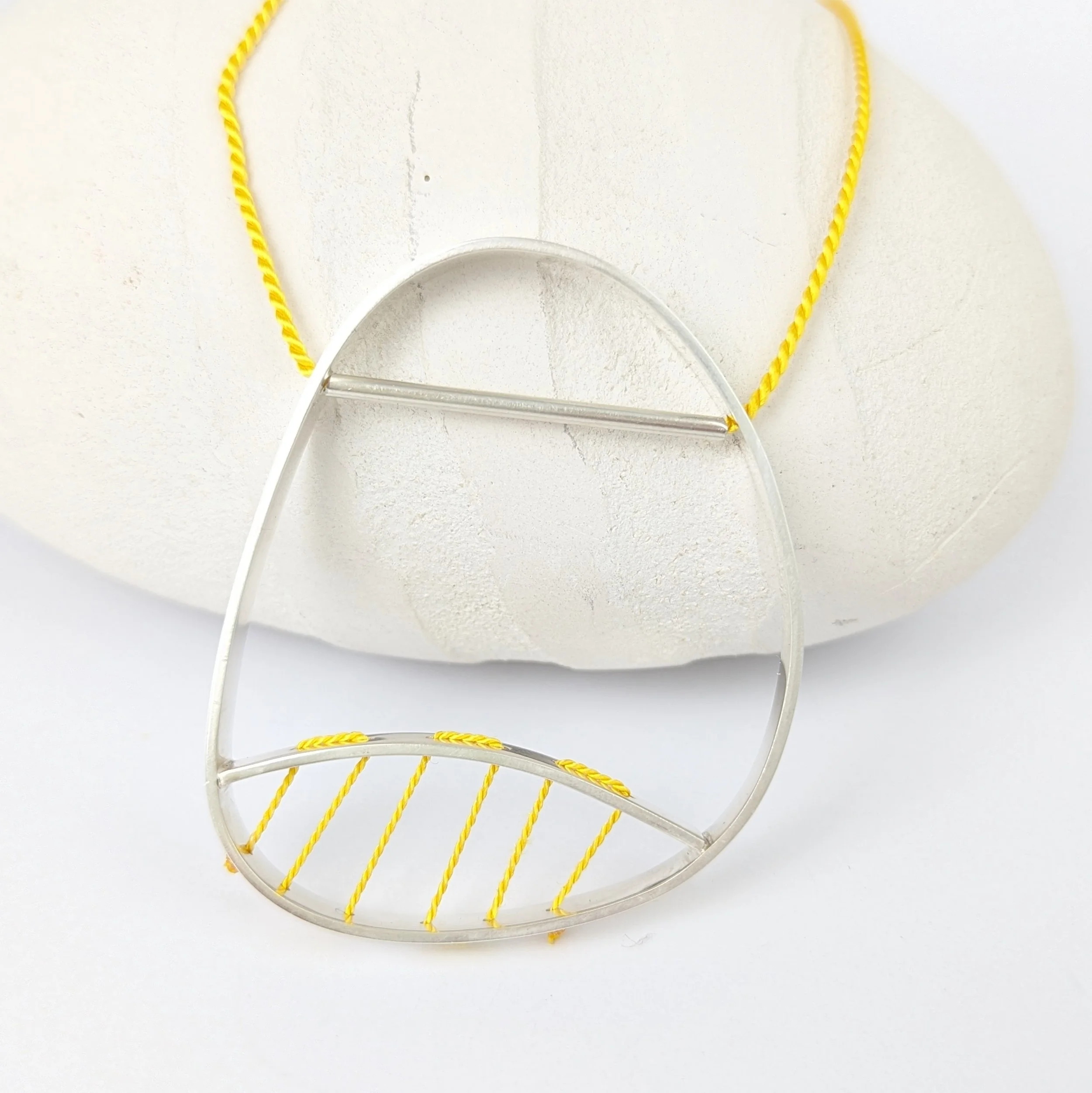 Hepworth necklace yellow on yellow2.jpg