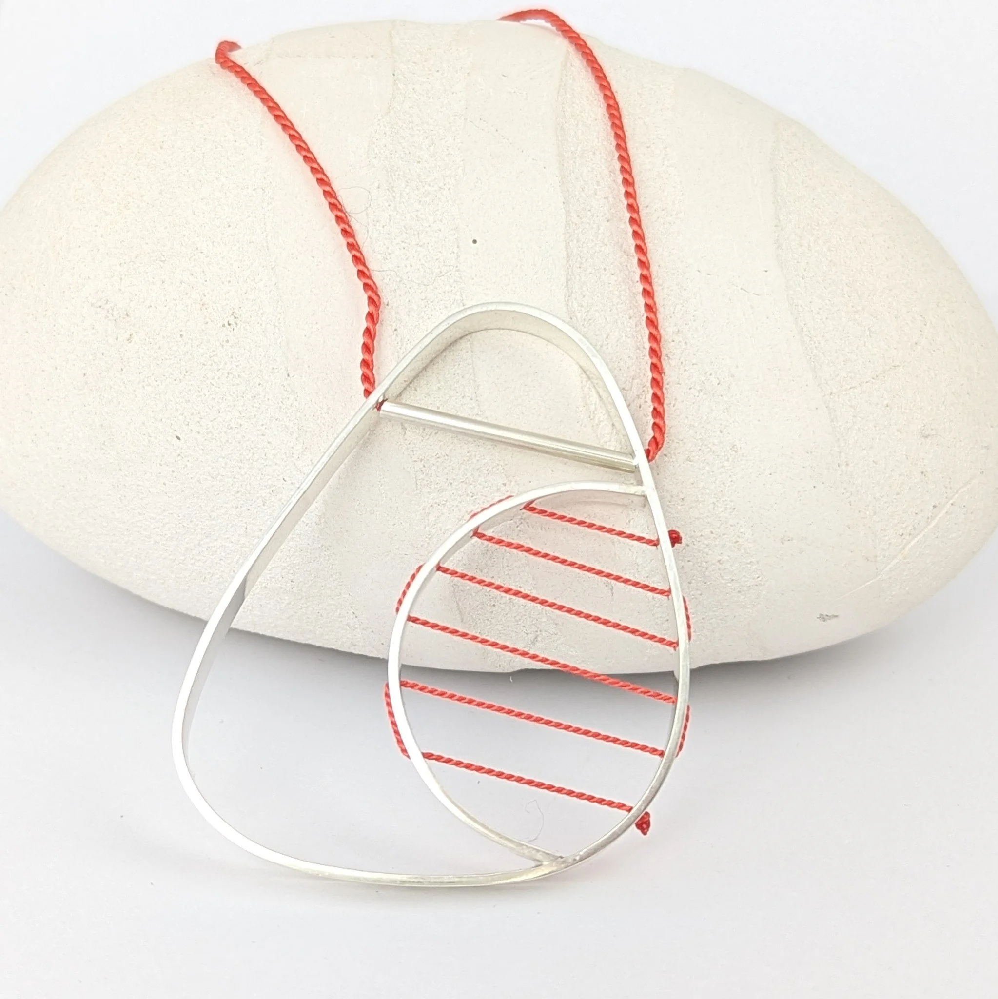 Hepworth necklace coral on coral.jpg