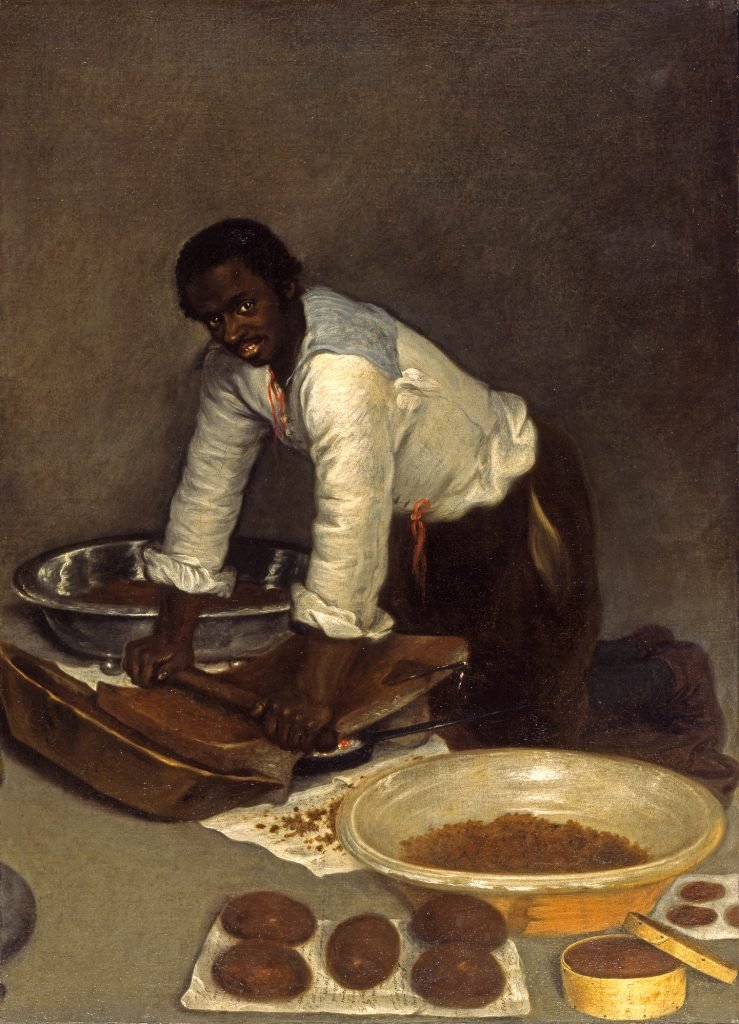 A Man Scraping Chocolate