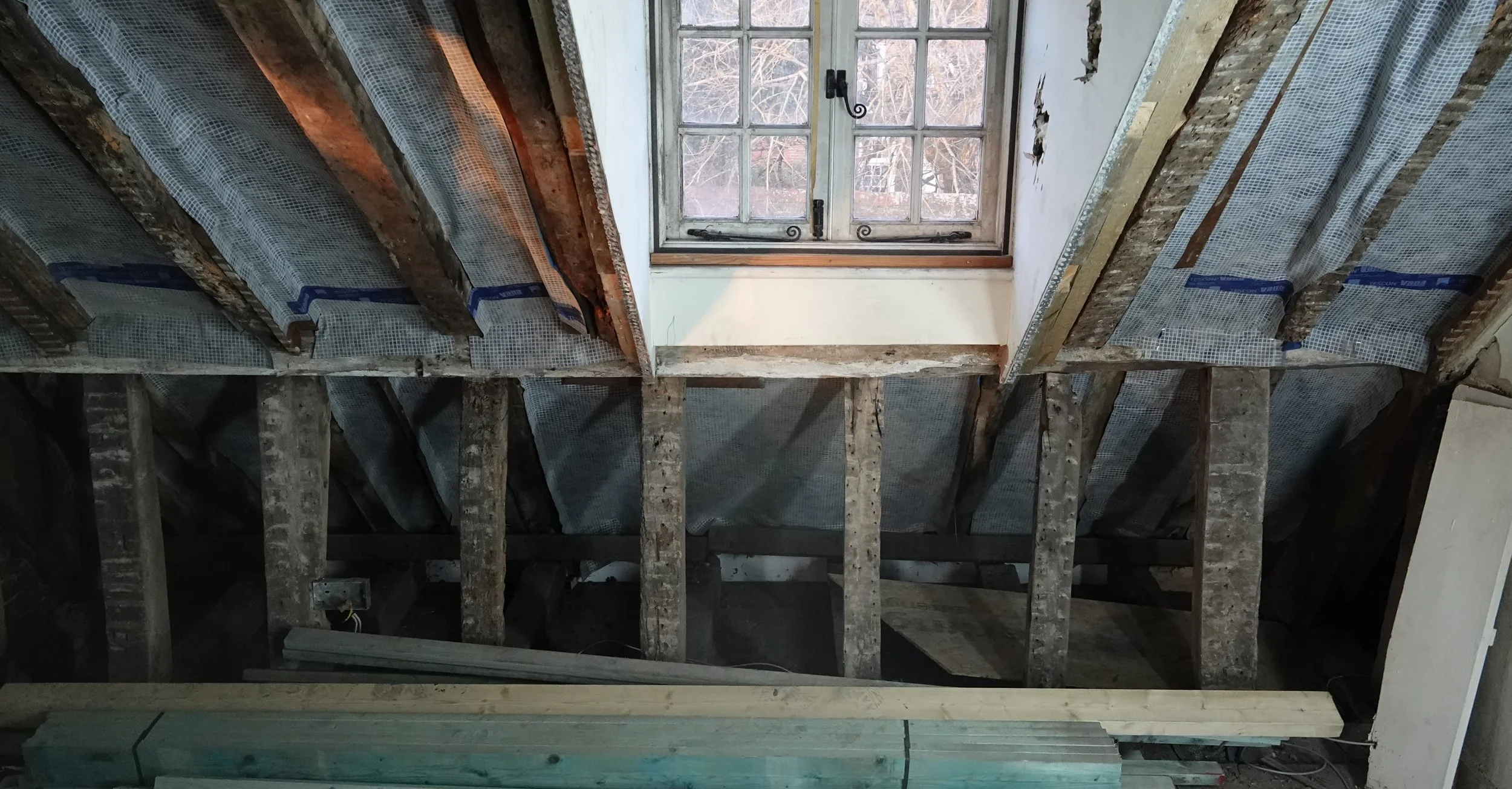Making a Grade 2 listed 1680s town house greener