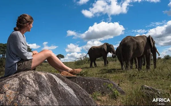Sam's partner Vera with elephants in the reserve.