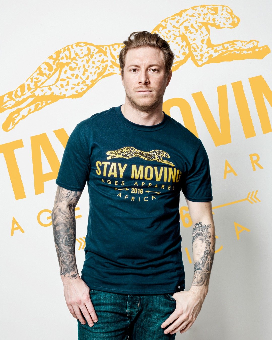 The Ages Apparel organic cotton tee is a testament to sustainable fashion and style featuring it's dynamic Stay Moving Cheetah design!

This piece not only stands out with its unique chest print and signature details but also aligns with ethical fash