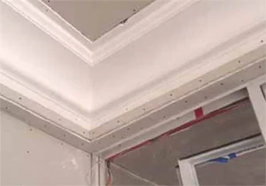STEP 2. Tape crown moulding & drywall flanges- no need for caulking or screw patches! Ready for paint!