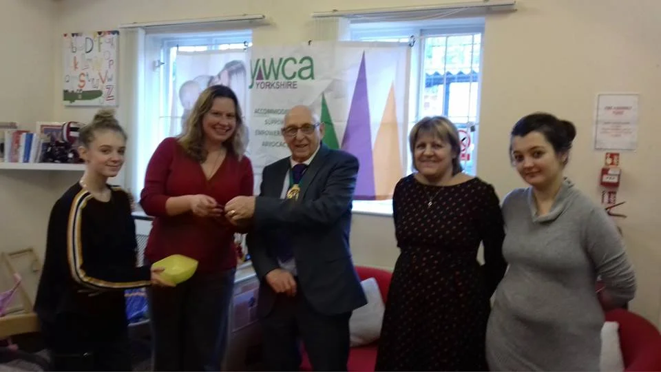 Tony Downing (centre) meets with Project Manager Sue Mastro (centre right), Senior Project Worker Claire Harding (centre left) and Peile House residents.