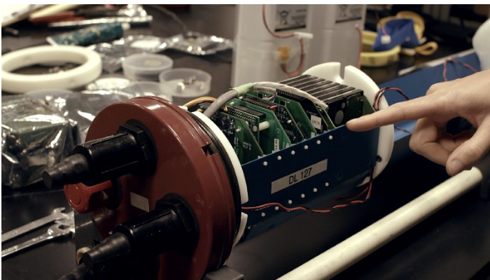 This is a HARP (high frequency audio recording package) disassembled back at NOAA’s lab. That’s what lives underwater and records the ocean noise that the scientists then download and analyze.