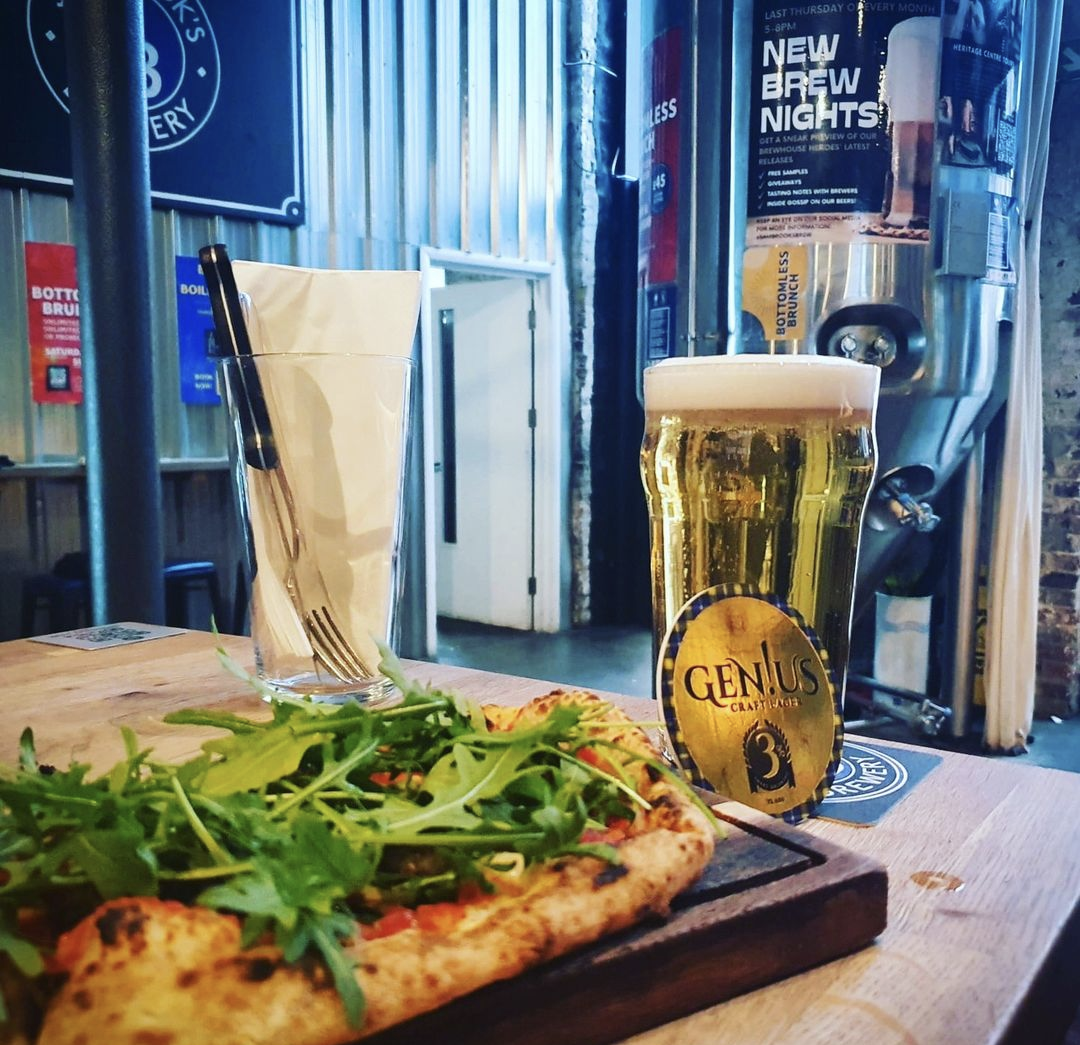 Sambrooks Brewery taproom pizza and Gen!us Craft Lager.png