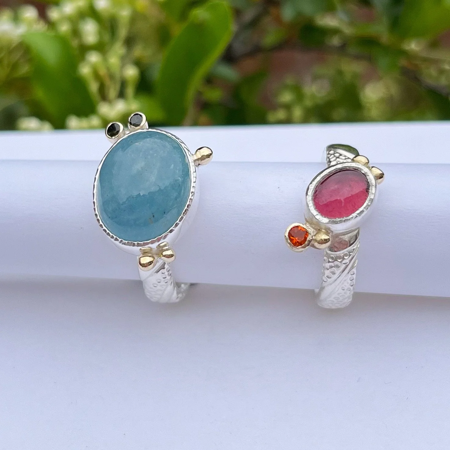 Silver 18ct gold, Aquamarine and green Touramline ring. Pink Tourmaline and fire Opal ring.