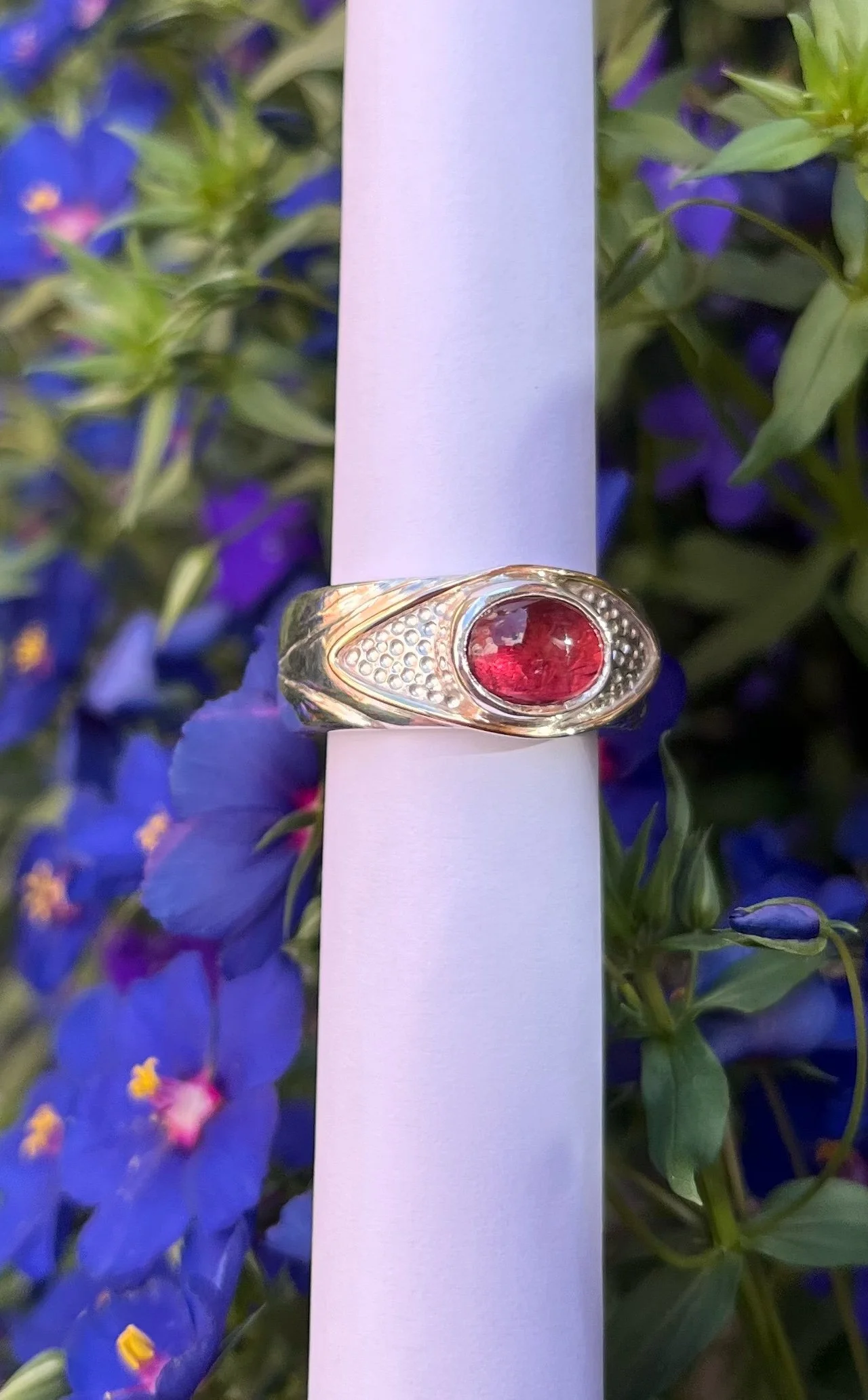 Chunky pink Tourmaline ring with gold detail.