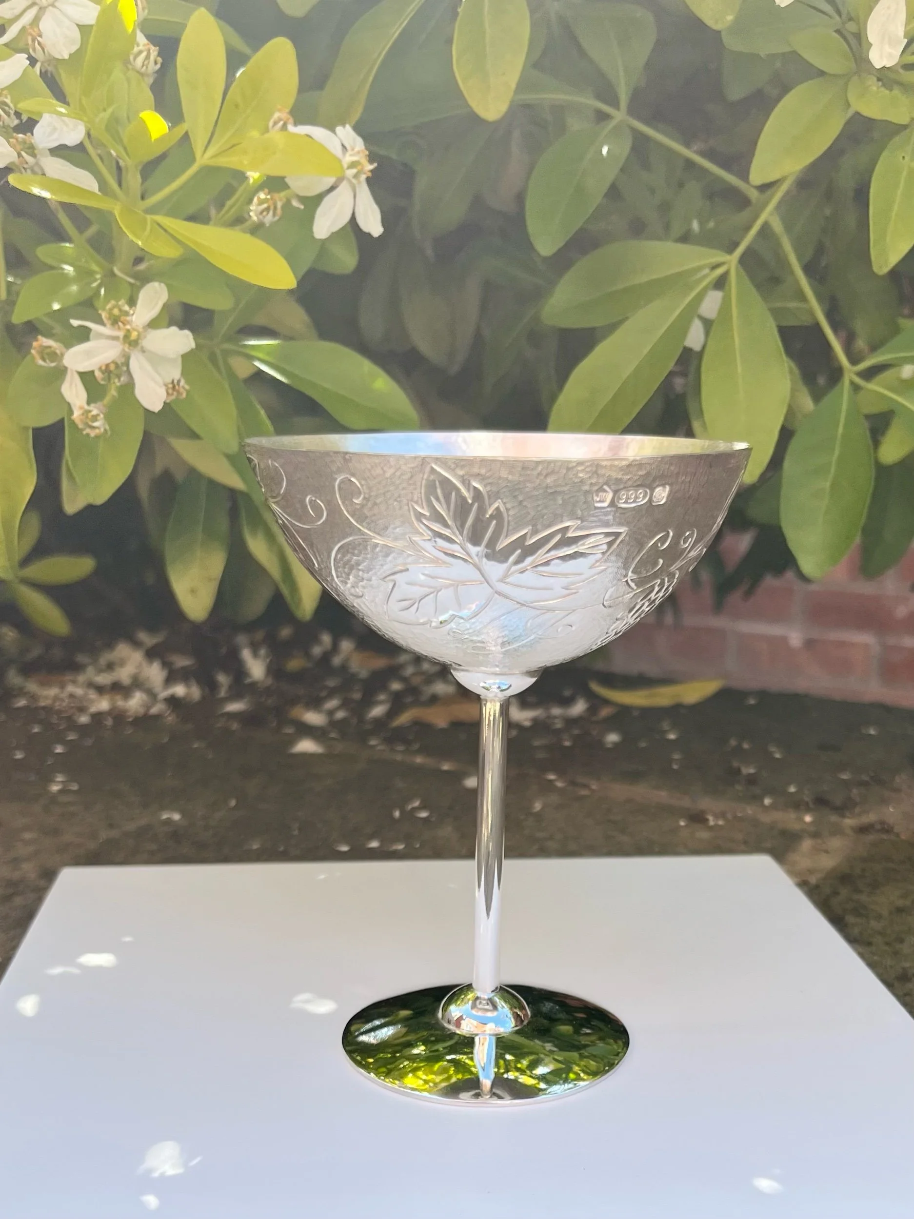 Hand raised and chased Silver prosecco cup.