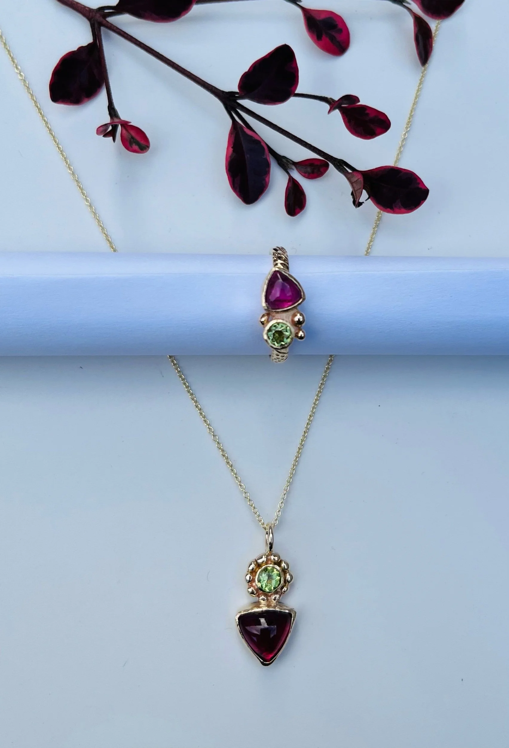 Pink tourmaline and peridot ring with matching pendant.