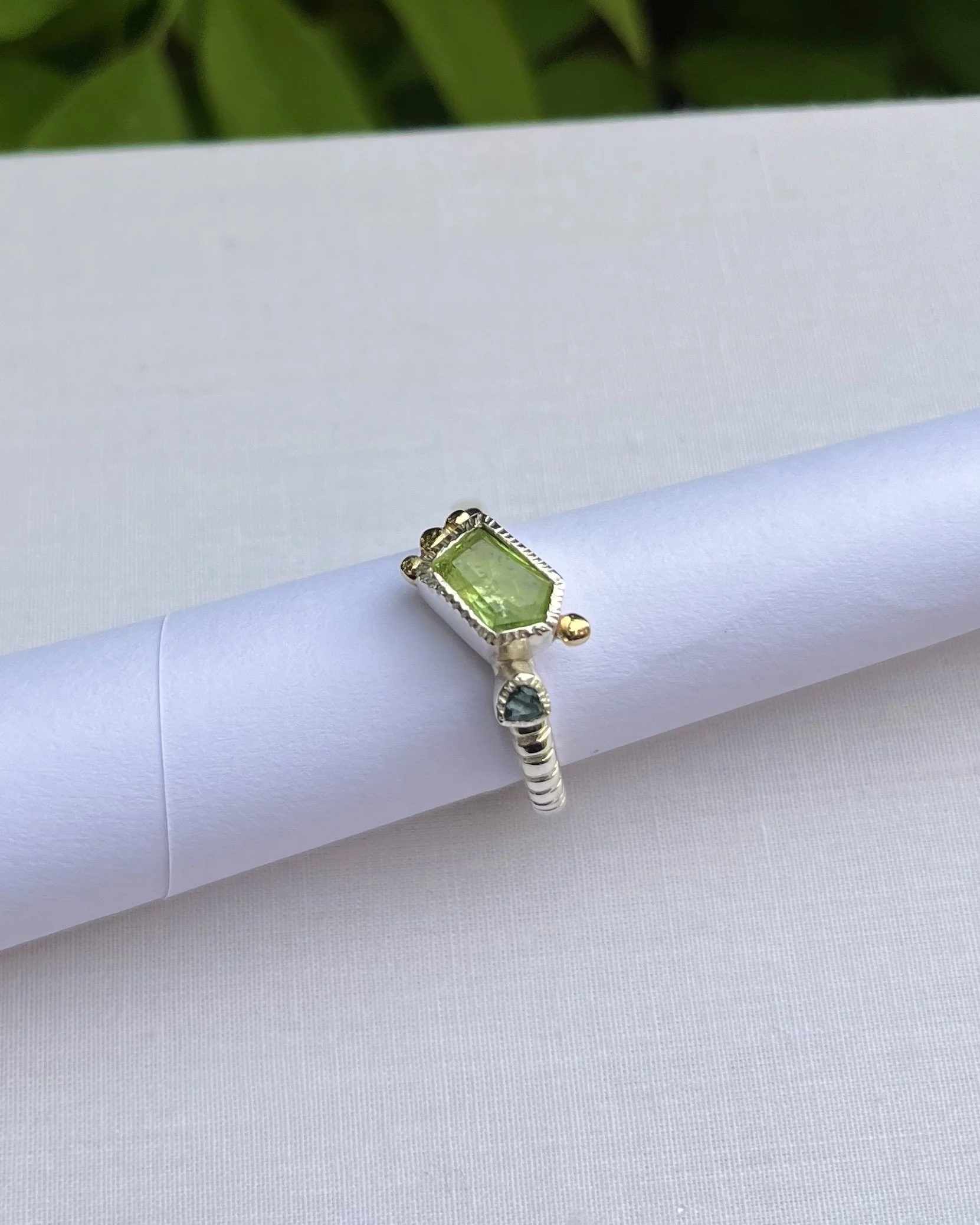 Peridot and London blue topaz ring with gold detail.  