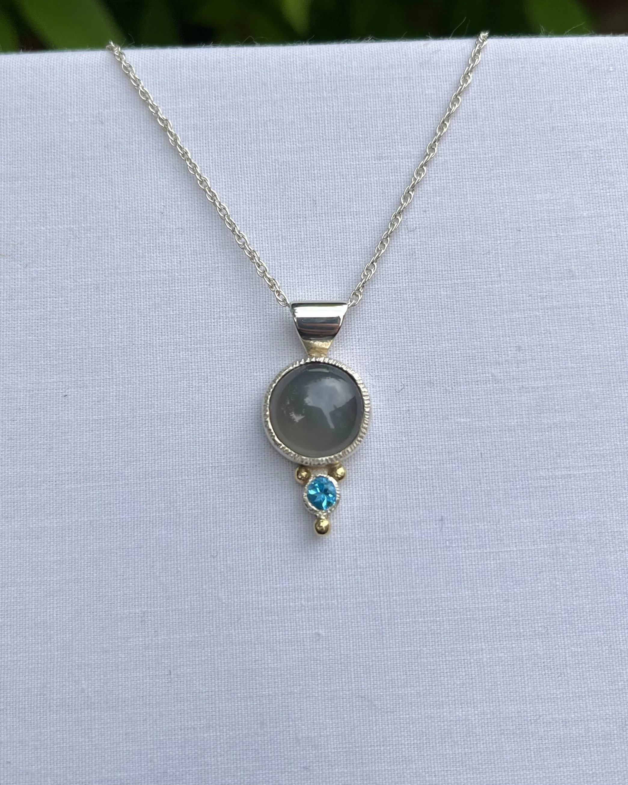Grey moonstone and blue topaz necklace.