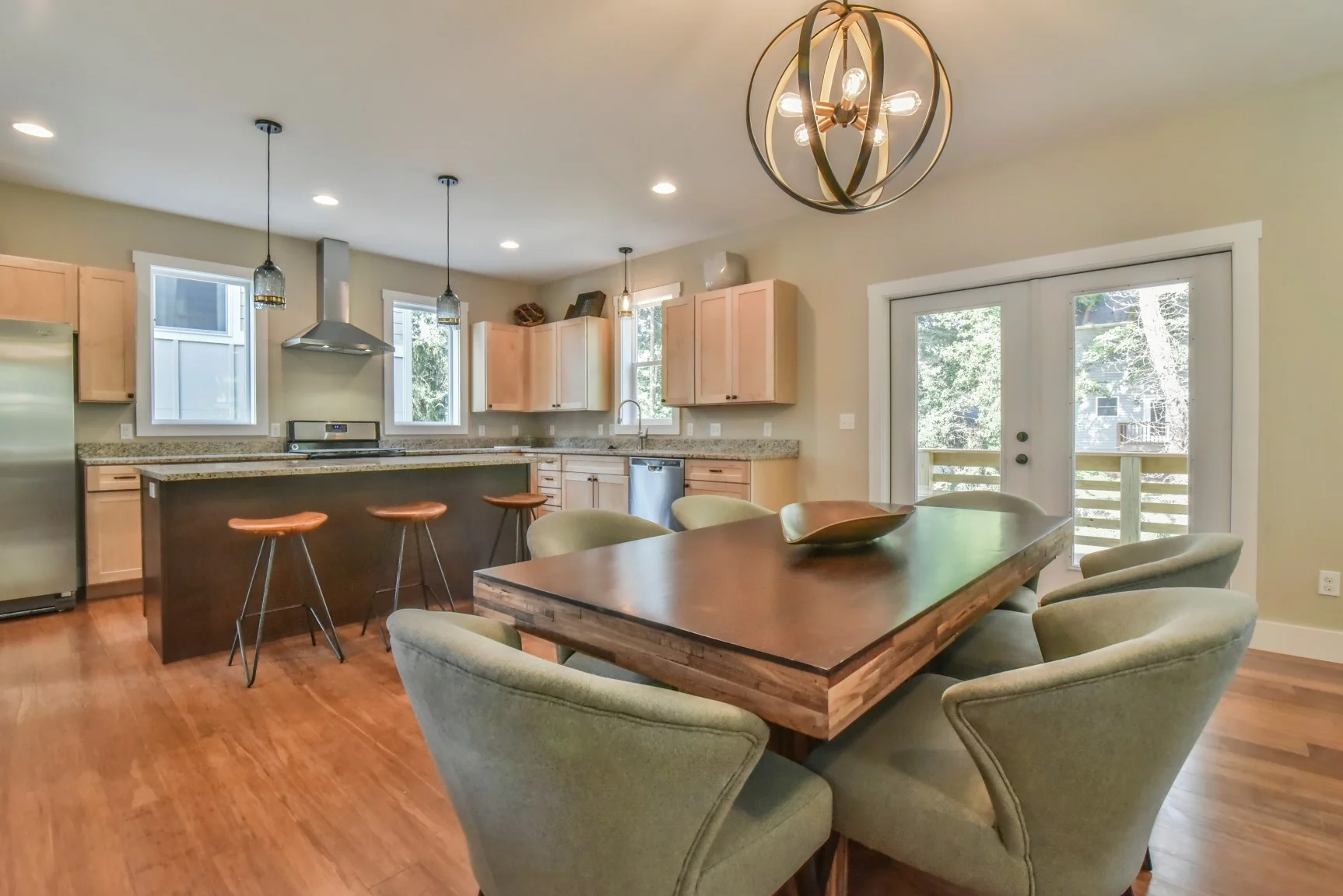 Kitchen/dining room opens to back spacious porch and private enclosure