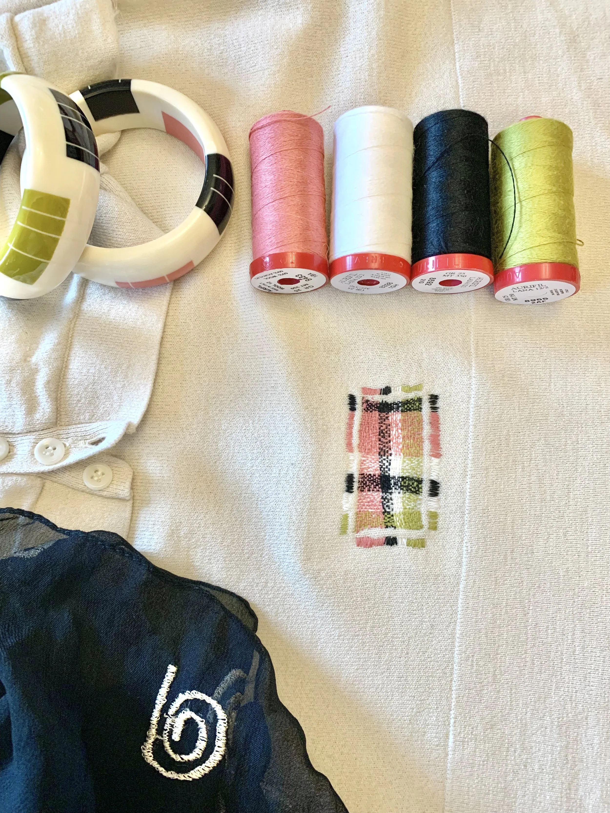 Creative Mending - a wool jumper and an embroidered patch