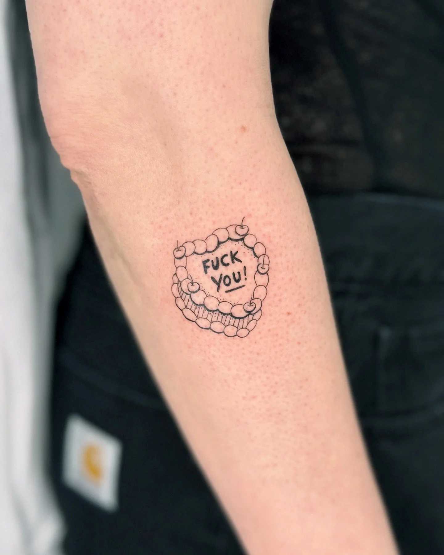 FrauInes_Tattoo_FuckYouTorte.jpg
