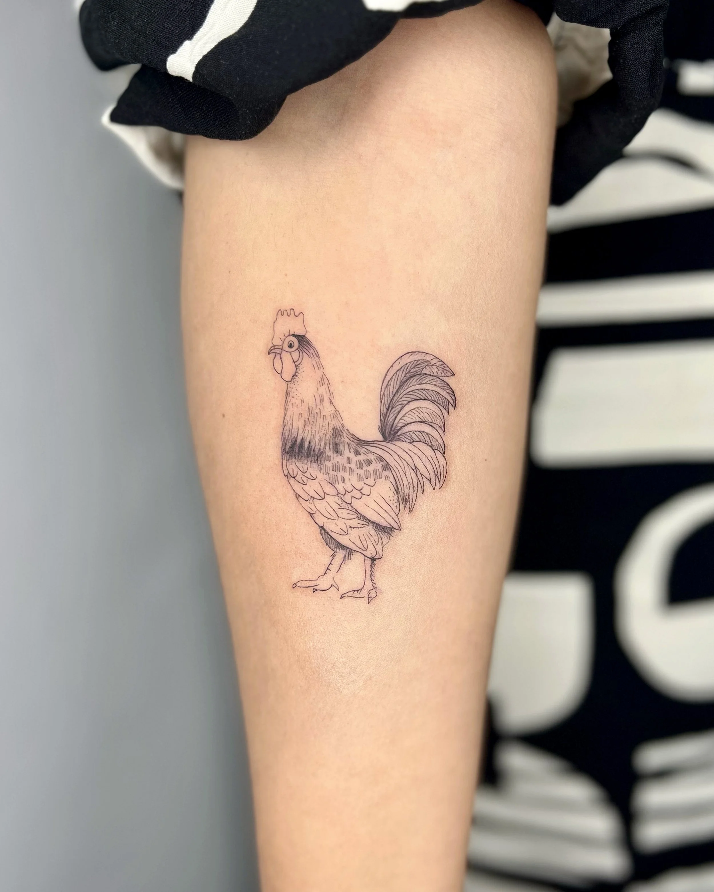 FrauInes_Tattoo_Hahn.jpg