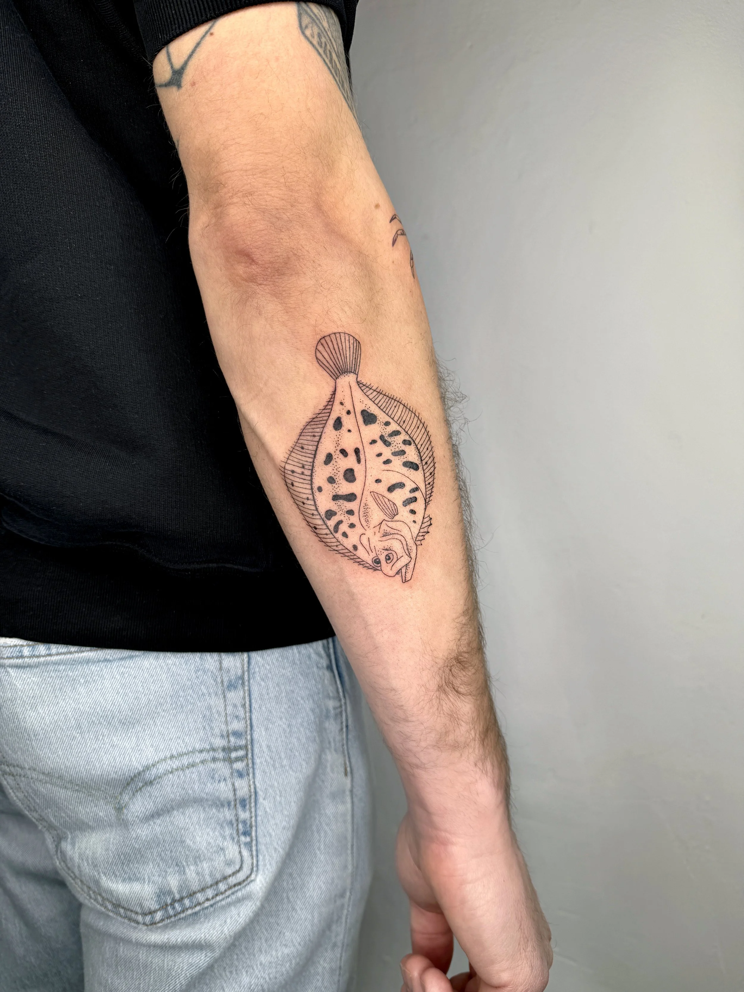 FrauInes_Tattoo_Heilbutt.jpg