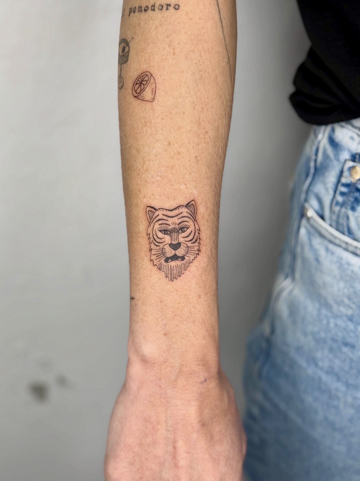 FrauInes_Tattoo_Tigerkopf.jpg