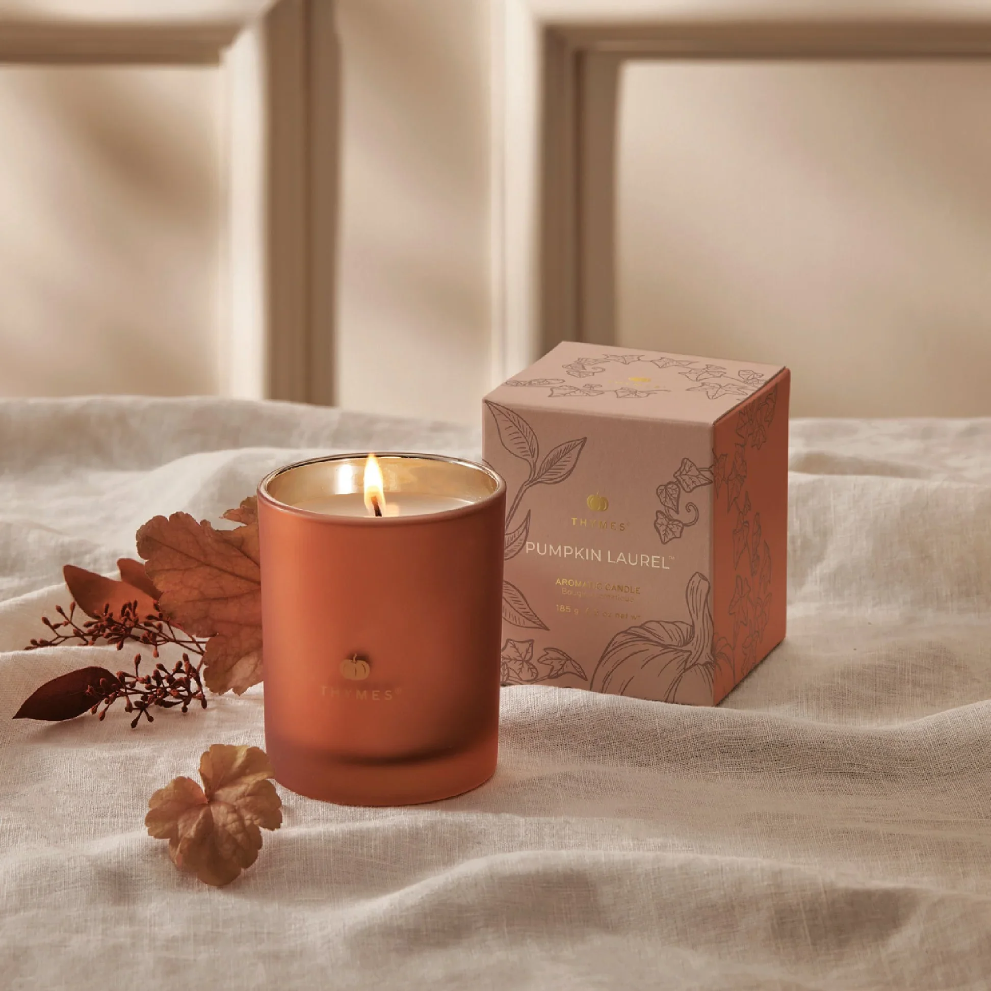 thymes-hy23-pumpkin-laurel-6.5oz-candle-web-alt-1.jpg.webp