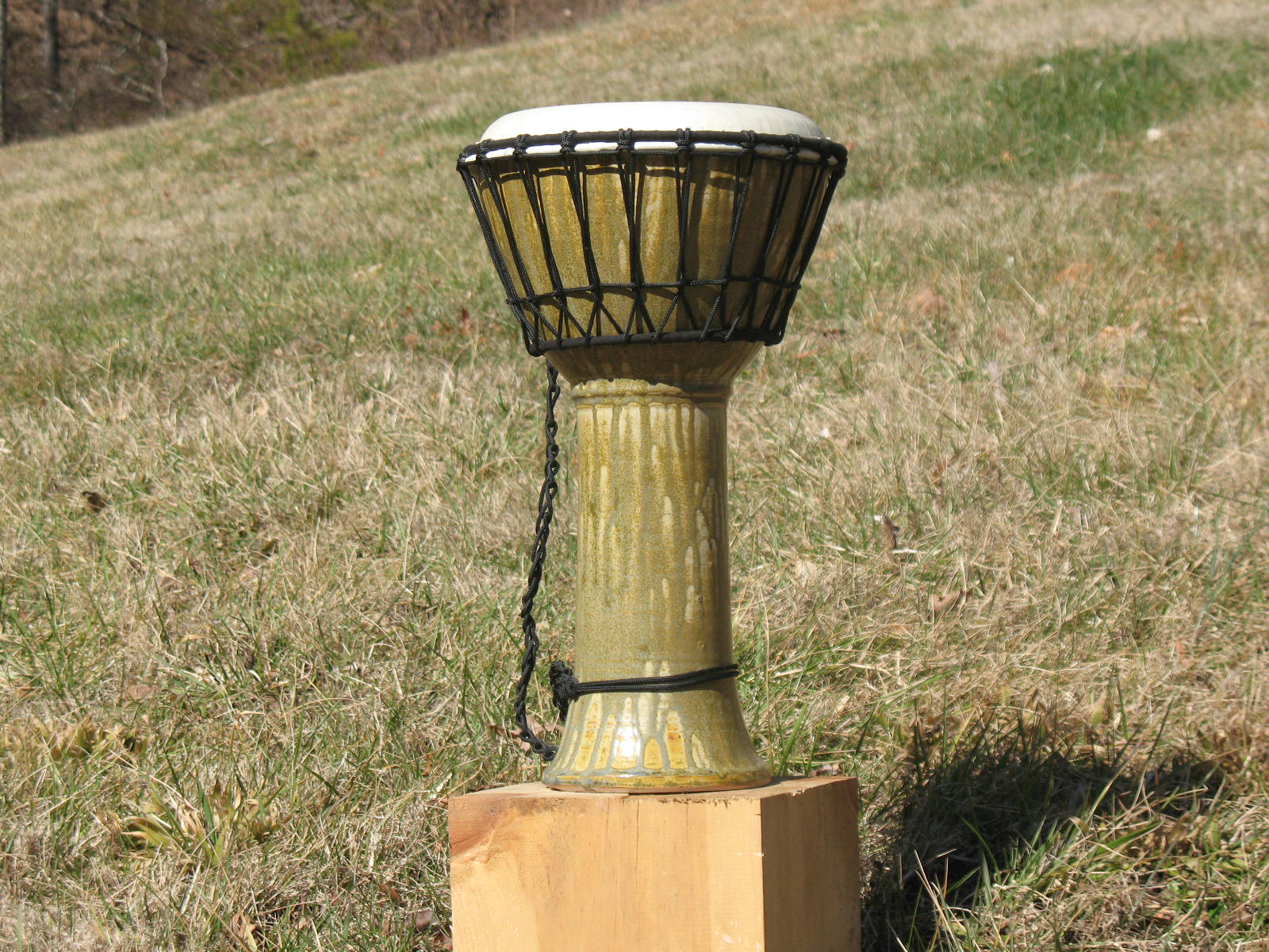  Larger drum with fake ash glaze. Gas fired.&nbsp; 10.5" head diameter, 21" height. 