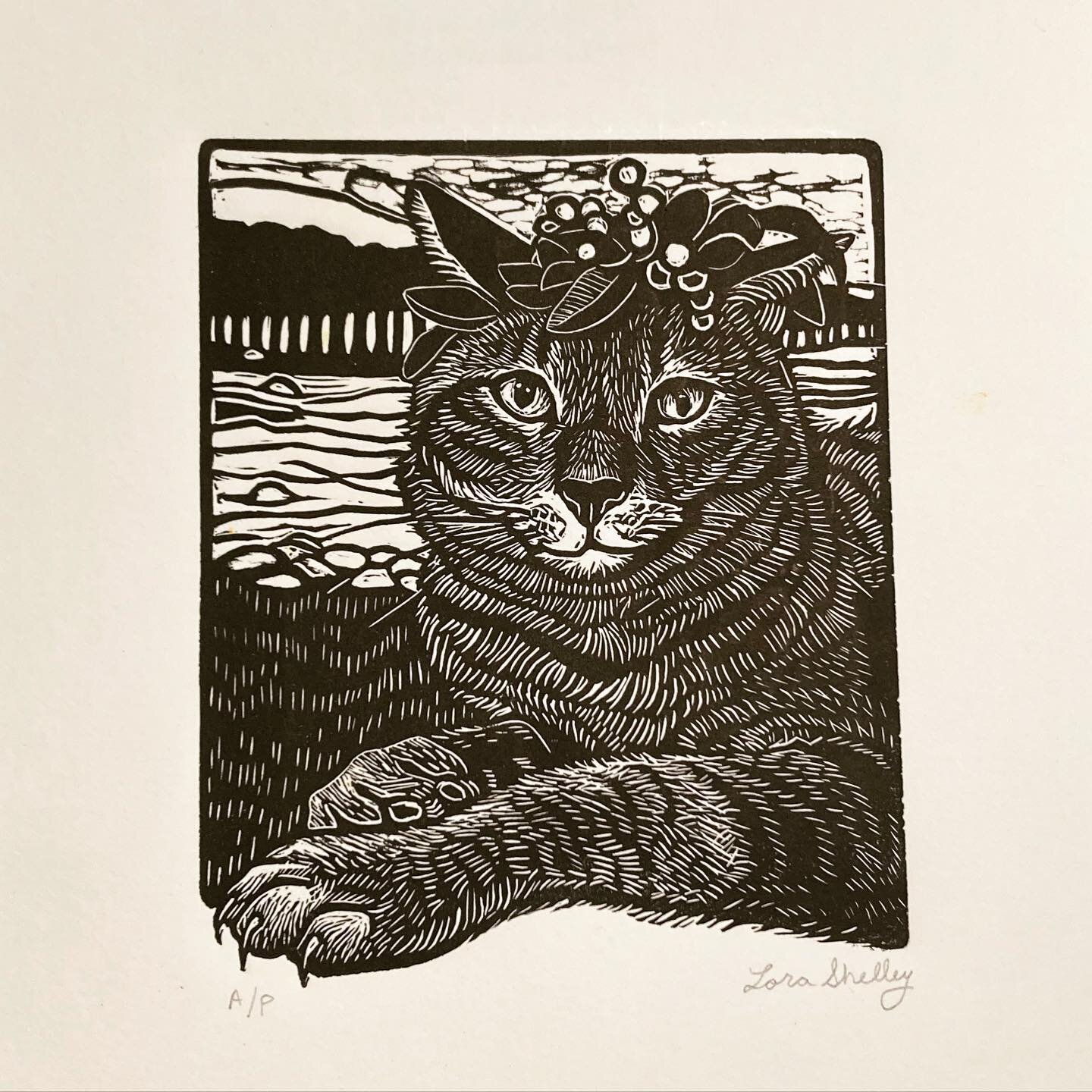 One of my new little linocuts. I will have this and other new prints this weekend @marketsatroundlake 
This kitty is based on my friend&rsquo;s cat. She was inspired by my year long project painting Charley cat. So she makes flower crowns and takes p