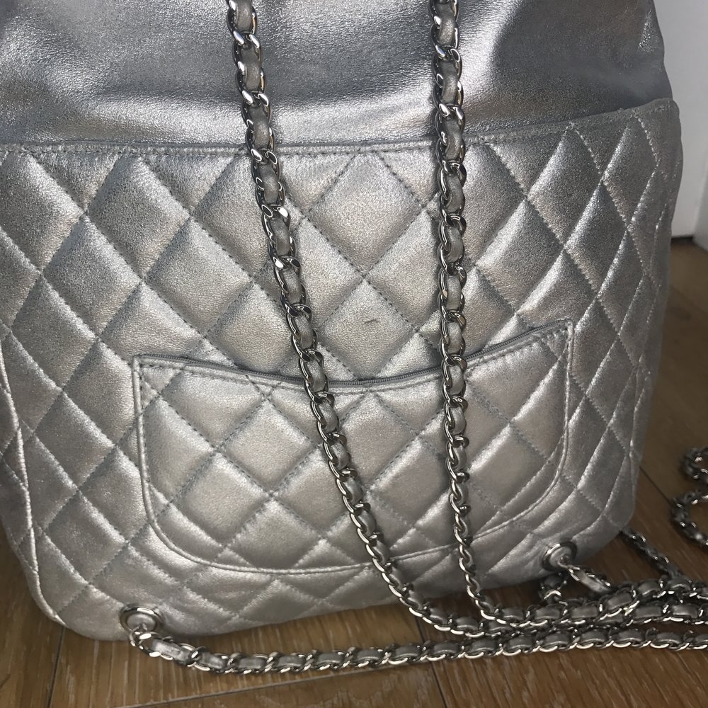 Chanel Backpack Metallic Quilted In Seoul Silver Lambskin Leather Backpack  — Olori Swank