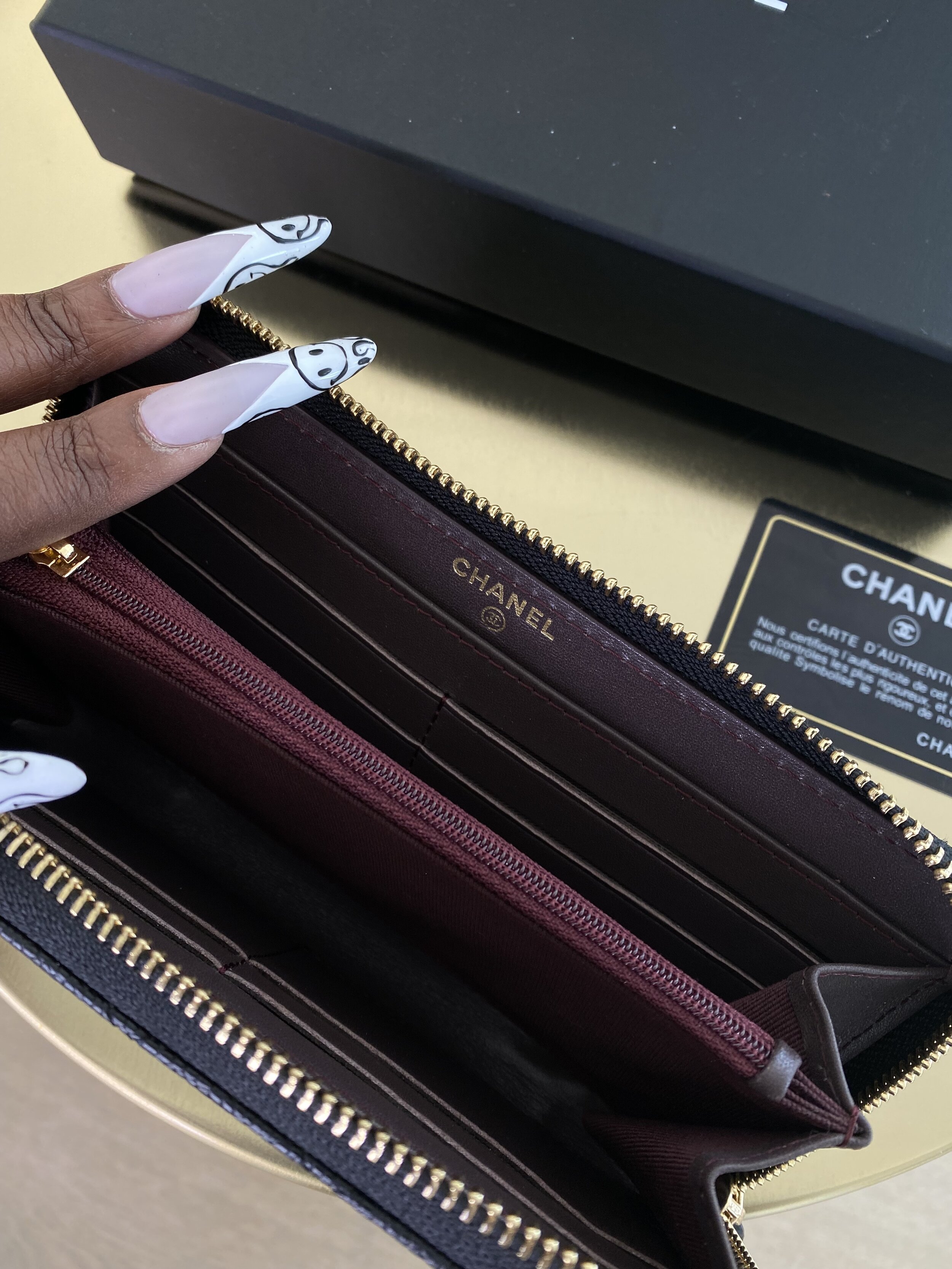 CHANEL BLACK QUILTED CAVIAR CONTINENTAL ZIP WALLET