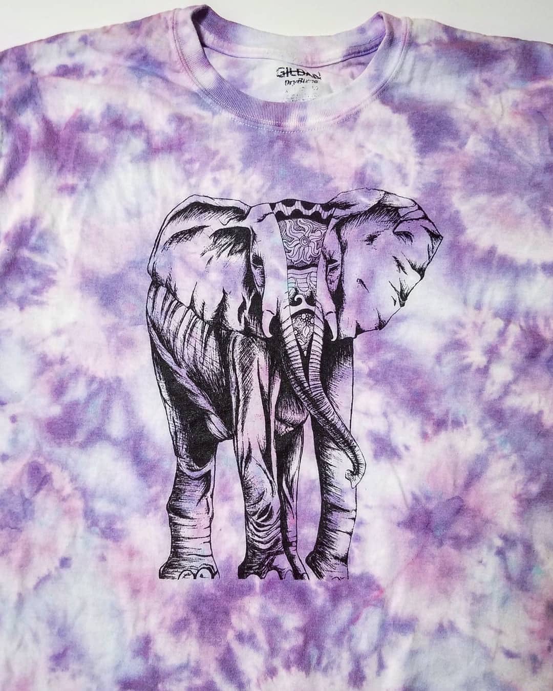 Personal design screen printed on a hand tie dyed t-shirt